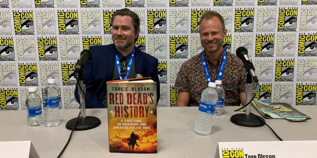 Actor Roger Clark and UT Associate Professor Tore Olsson signed copies of Olsson’s book Red Dead’s History at the 2024 San Diego Comic-Con.
